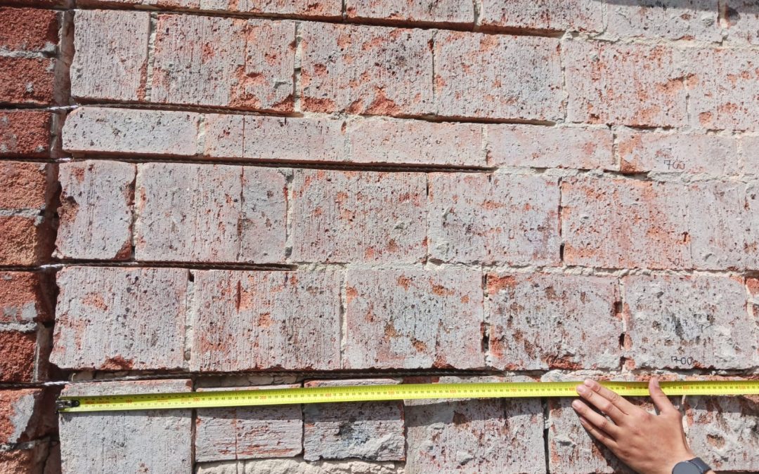 Understanding and Resolving Brick Wall Cracks with Helical Bar